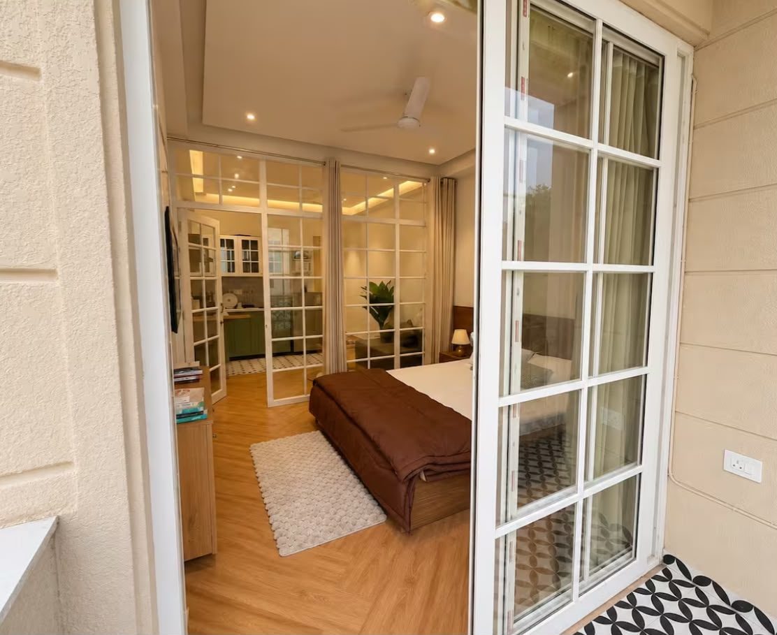 Bedroom seen through French doors