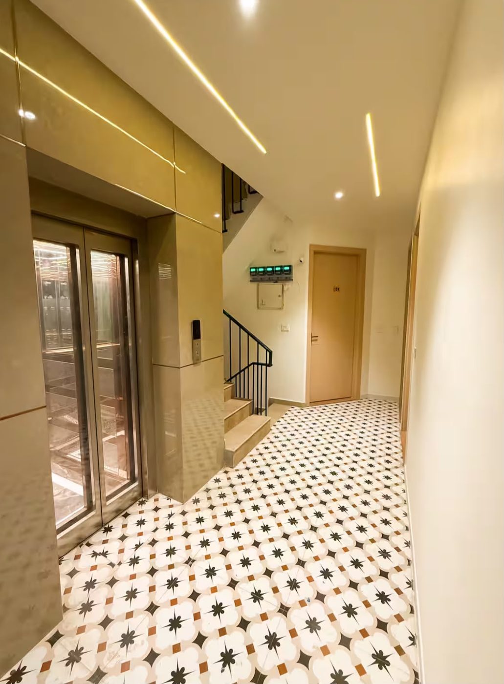 Lift lobby with patterned floor tiles