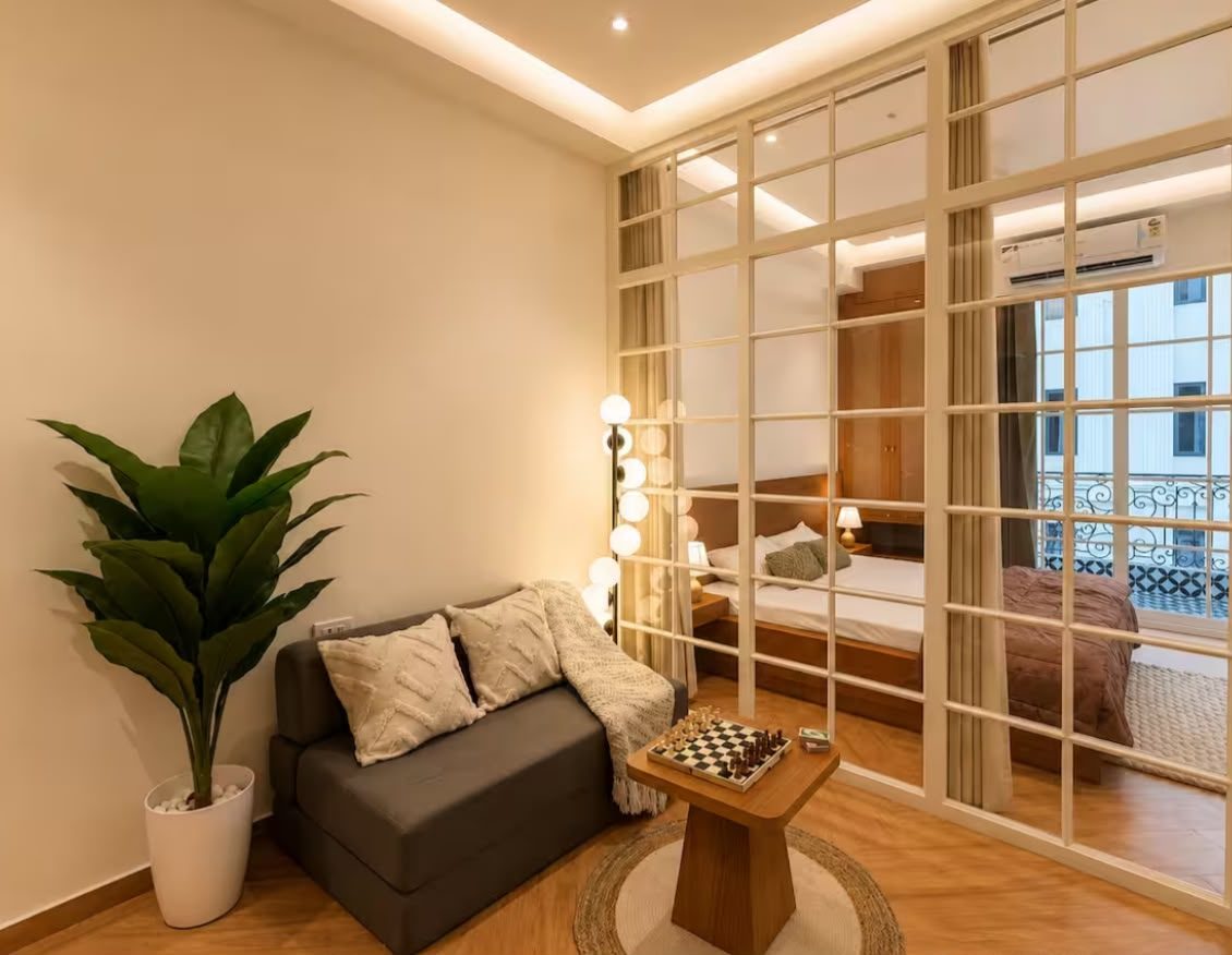 Living room with sofa and glazed partition